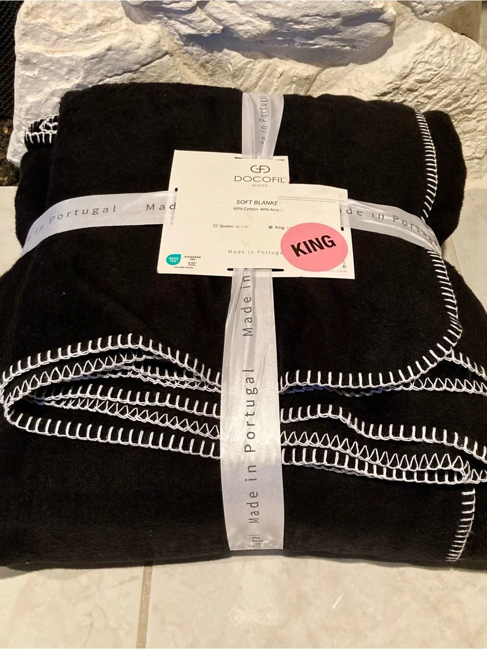 NWT “Docofil White” Soft King Blanket in Black with White Whipstitch Detail